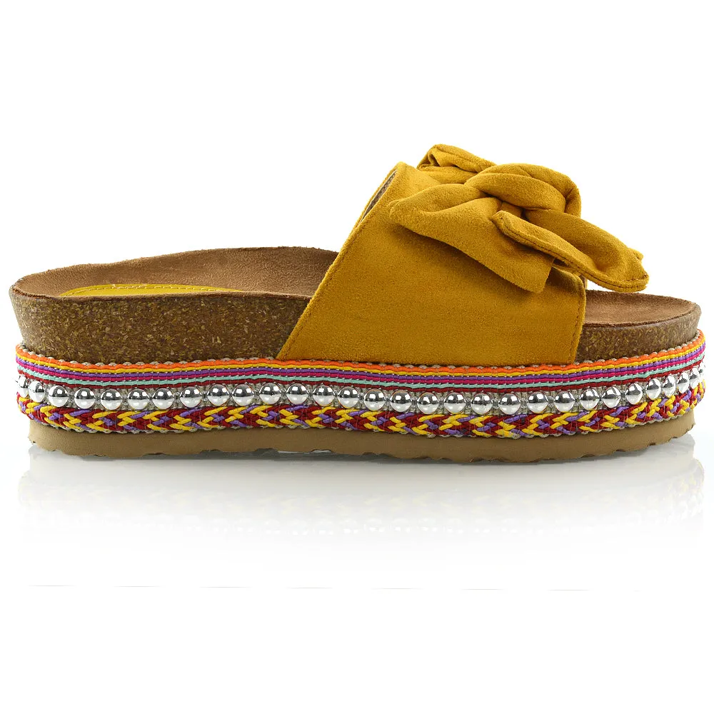 RONNIE BOW DETAIL STRAPPY SLIDER FLATFORM SUMMER SANDALS IN MUSTARD FAUX SUEDE