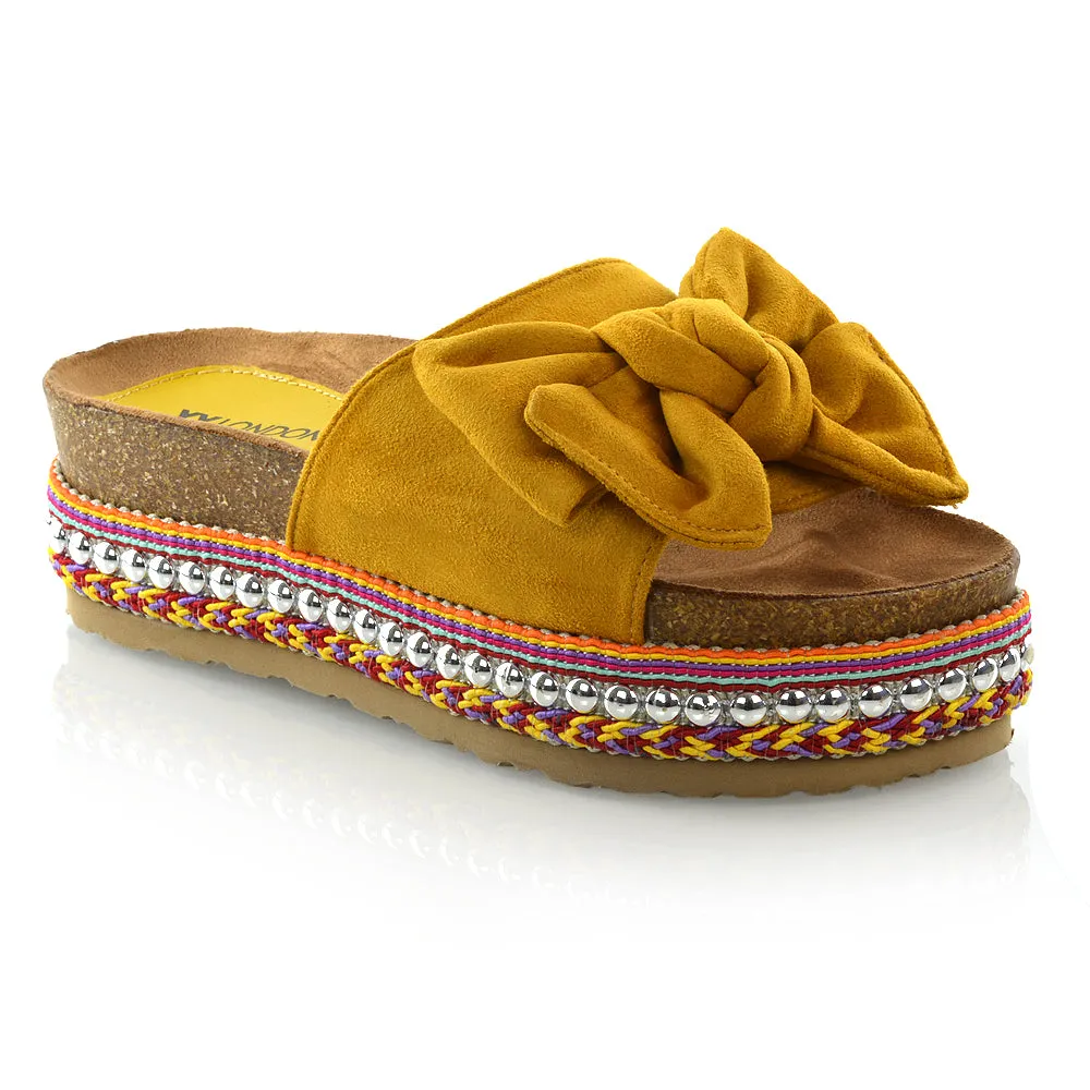 RONNIE BOW DETAIL STRAPPY SLIDER FLATFORM SUMMER SANDALS IN MUSTARD FAUX SUEDE