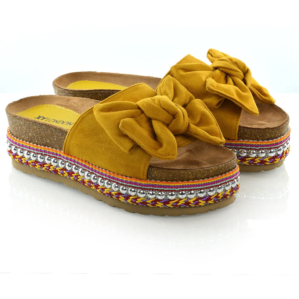 RONNIE BOW DETAIL STRAPPY SLIDER FLATFORM SUMMER SANDALS IN MUSTARD FAUX SUEDE