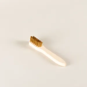 Suede brass brush